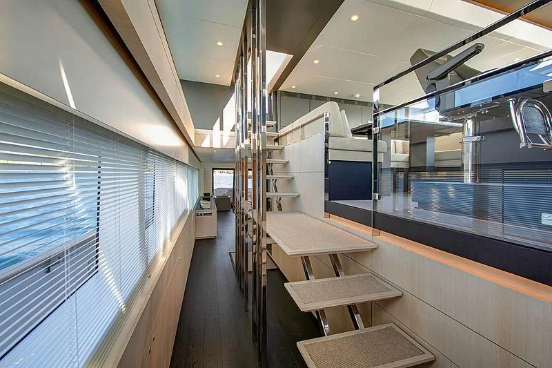 a room with a large glass wall aboard JANGADA Yacht for Sale