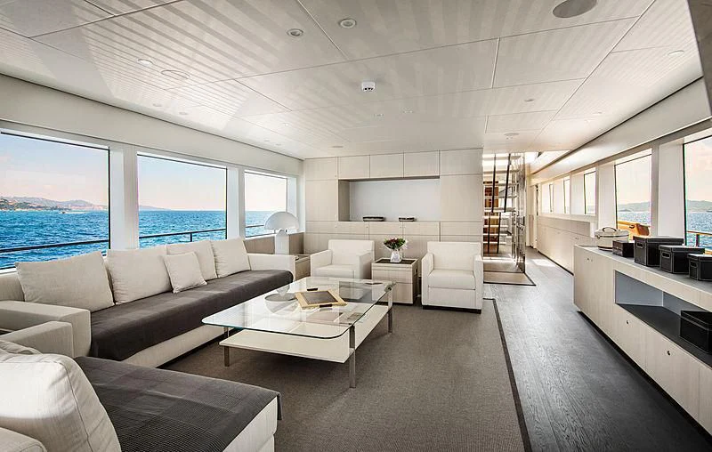 a living room with a large window aboard JANGADA Yacht for Sale