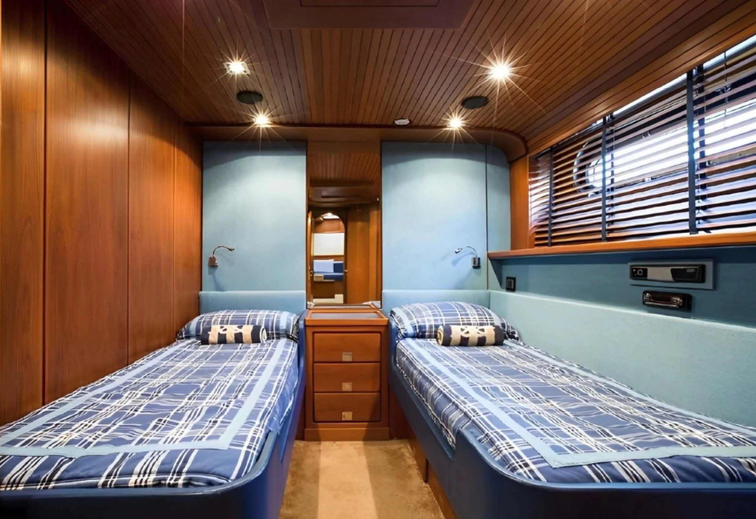 a room with two beds aboard ELETTRA Yacht for Sale