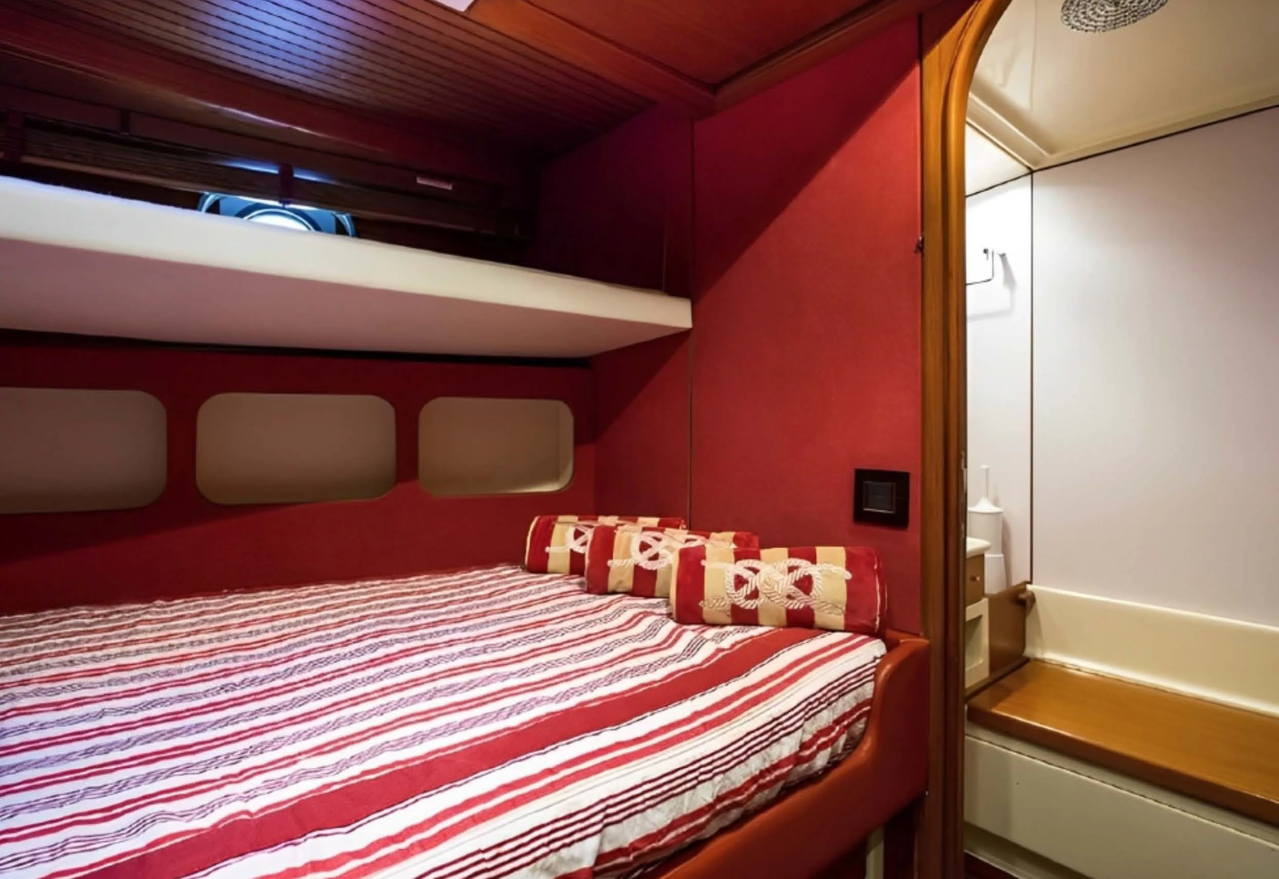 a bed in a room aboard ELETTRA Yacht for Sale