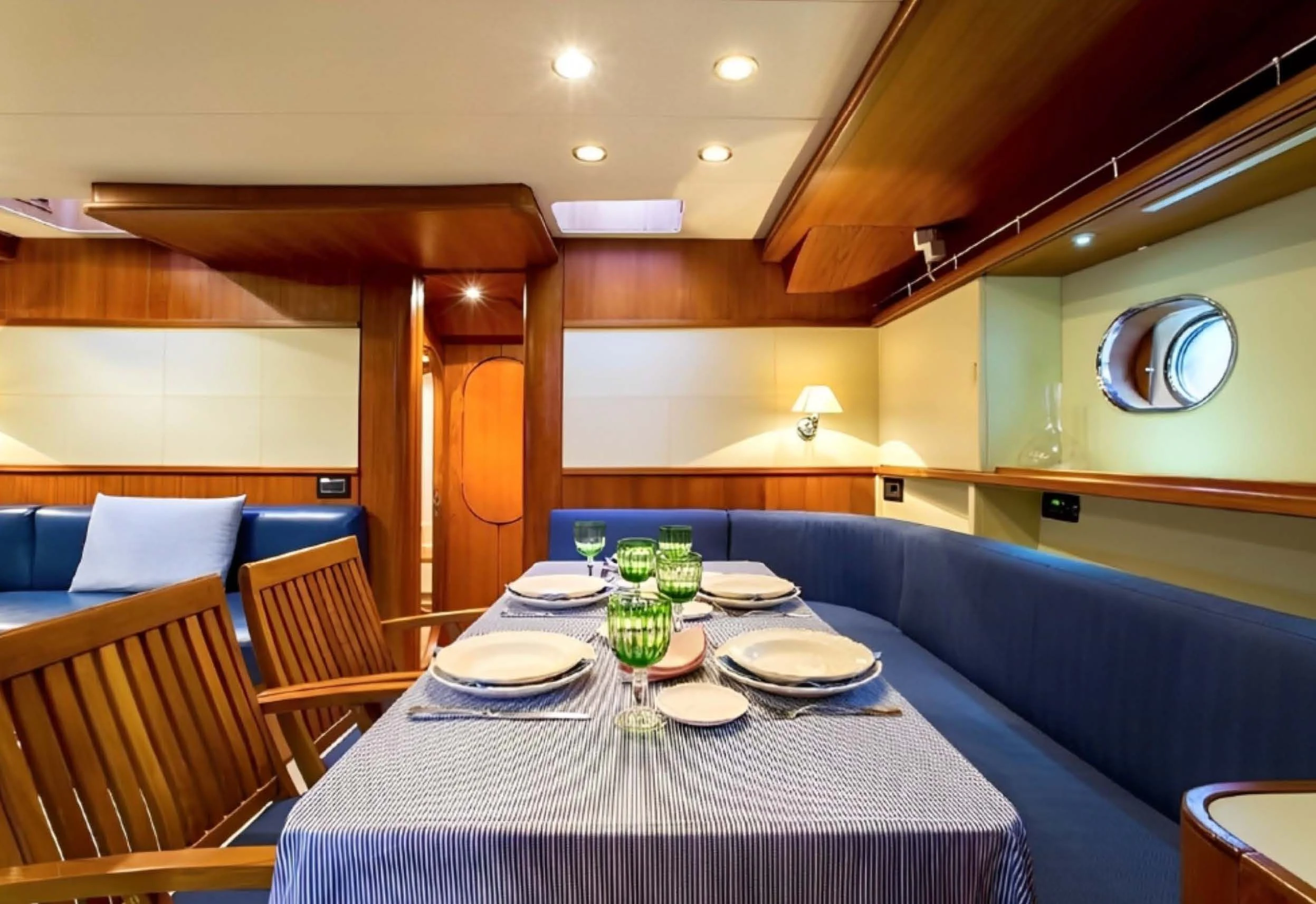 a dining room with a table aboard ELETTRA Yacht for Sale