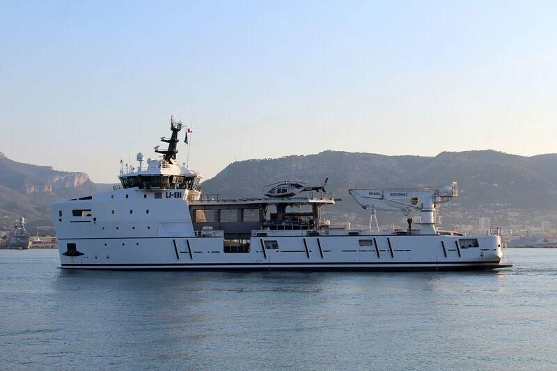 a large white boat in the water aboard WINGMAN Yacht for Sale