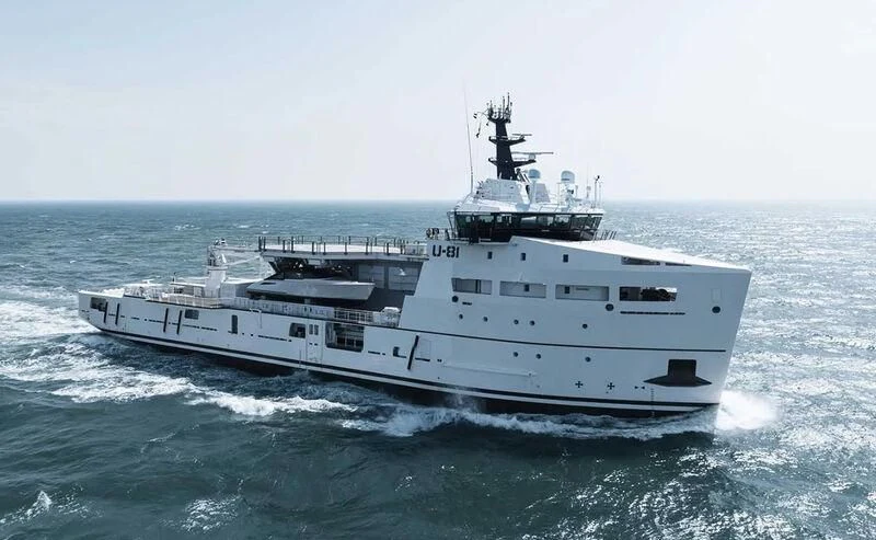 a large white ship in the water aboard WINGMAN Yacht for Sale