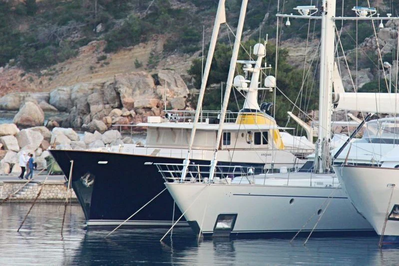 a boat docked at a pier aboard ARIONAS Yacht for Sale
