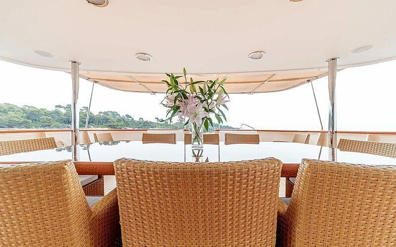a vase of flowers on a boat aboard ARIONAS Yacht for Sale
