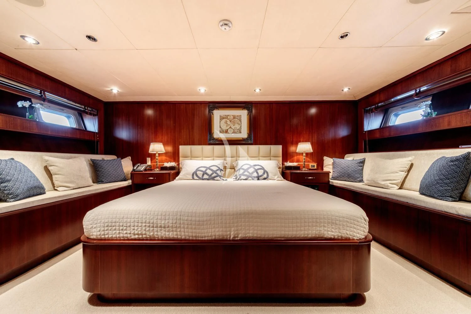 a room with a bed and a desk aboard ARIONAS Yacht for Sale