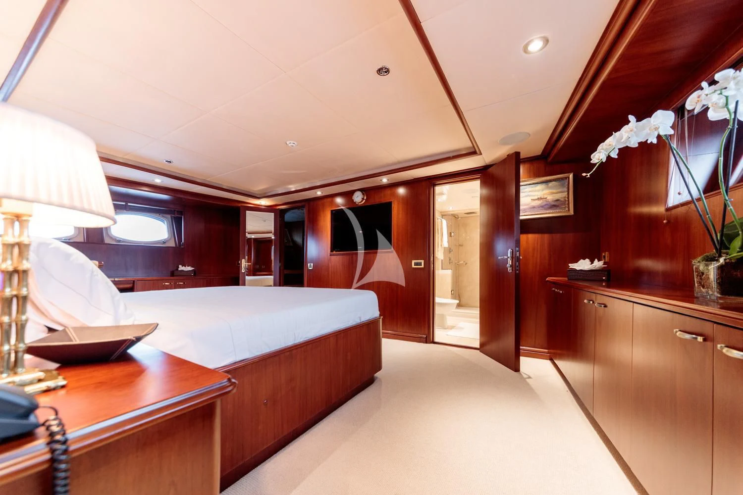 a room with a bed and a table aboard ARIONAS Yacht for Sale