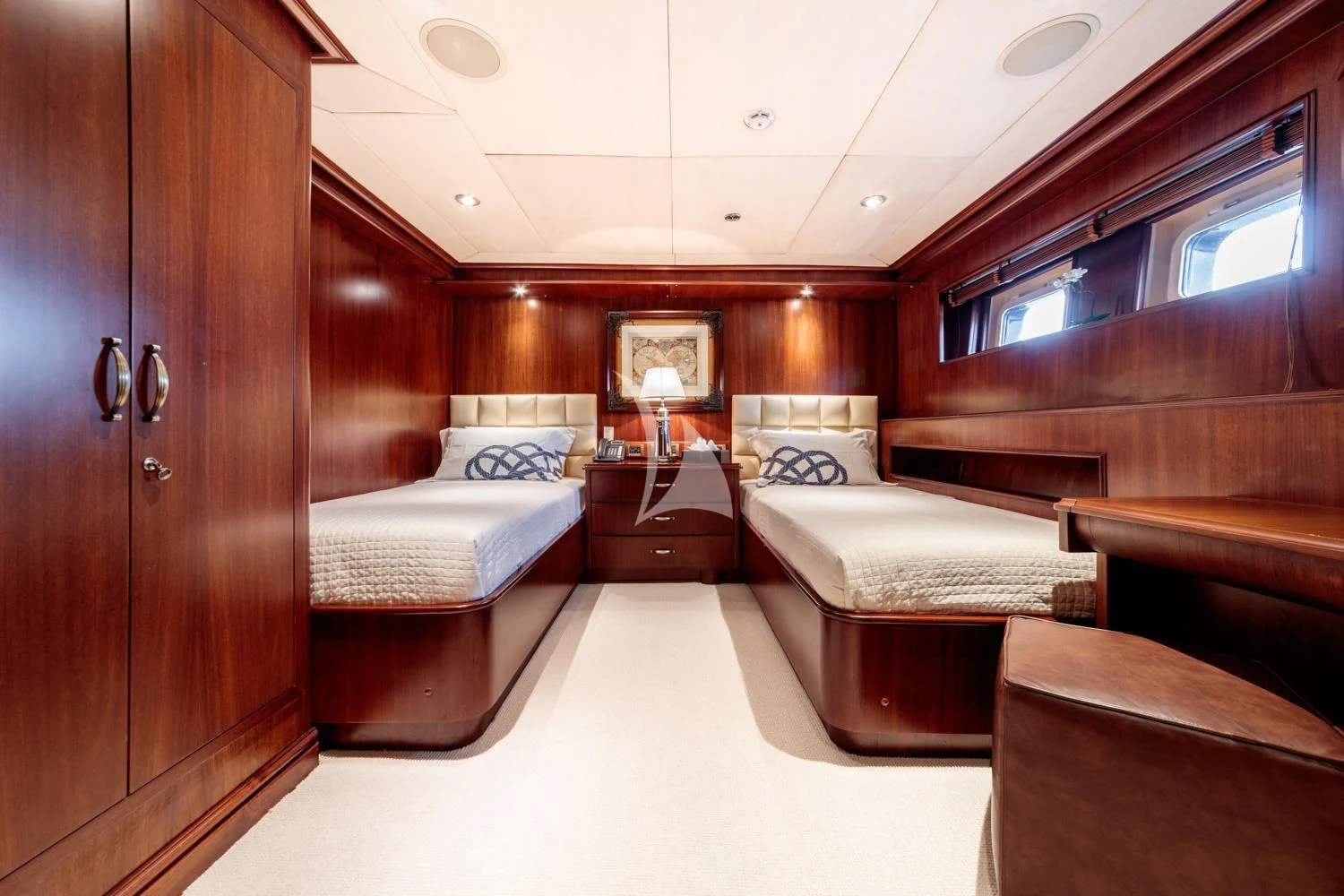 a room with a bed and a desk aboard ARIONAS Yacht for Sale