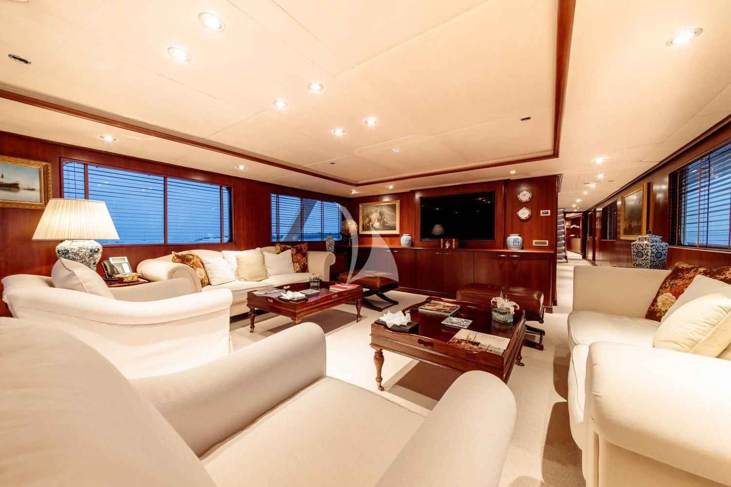 a living room with a large window aboard ARIONAS Yacht for Sale