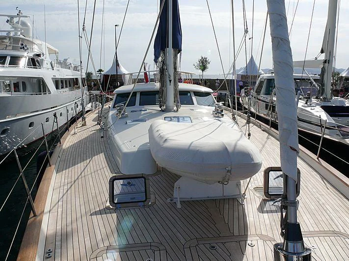 a boat docked at a pier aboard NAKUPENDA Yacht for Sale