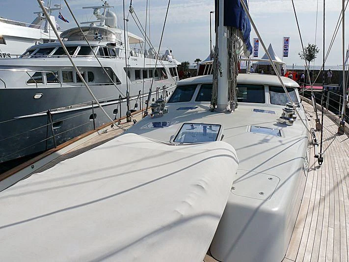 a group of boats are parked on a dock aboard NAKUPENDA Yacht for Sale