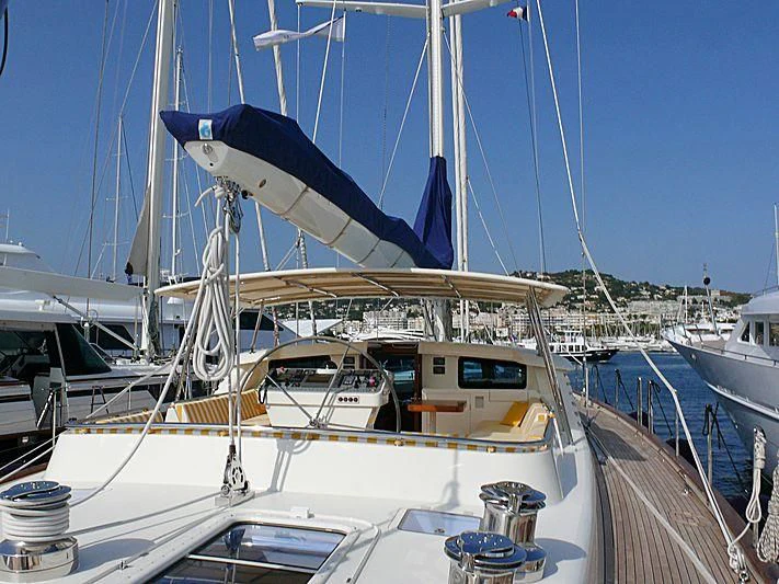 a boat docked at a pier aboard NAKUPENDA Yacht for Sale