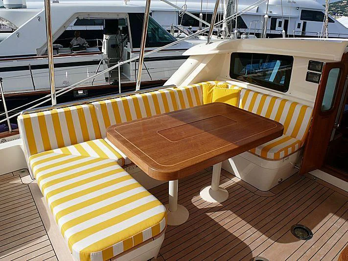 a boat with a bench aboard NAKUPENDA Yacht for Sale