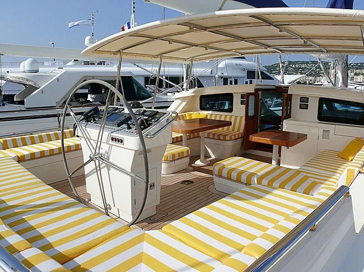 a boat docked at a pier aboard NAKUPENDA Yacht for Sale