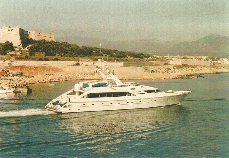 a white boat on the water aboard TIME Yacht for Sale