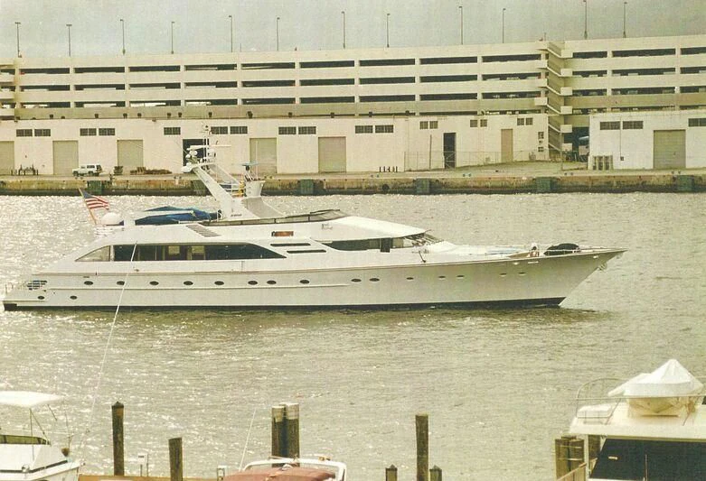 a white yacht in the water aboard TIME Yacht for Sale