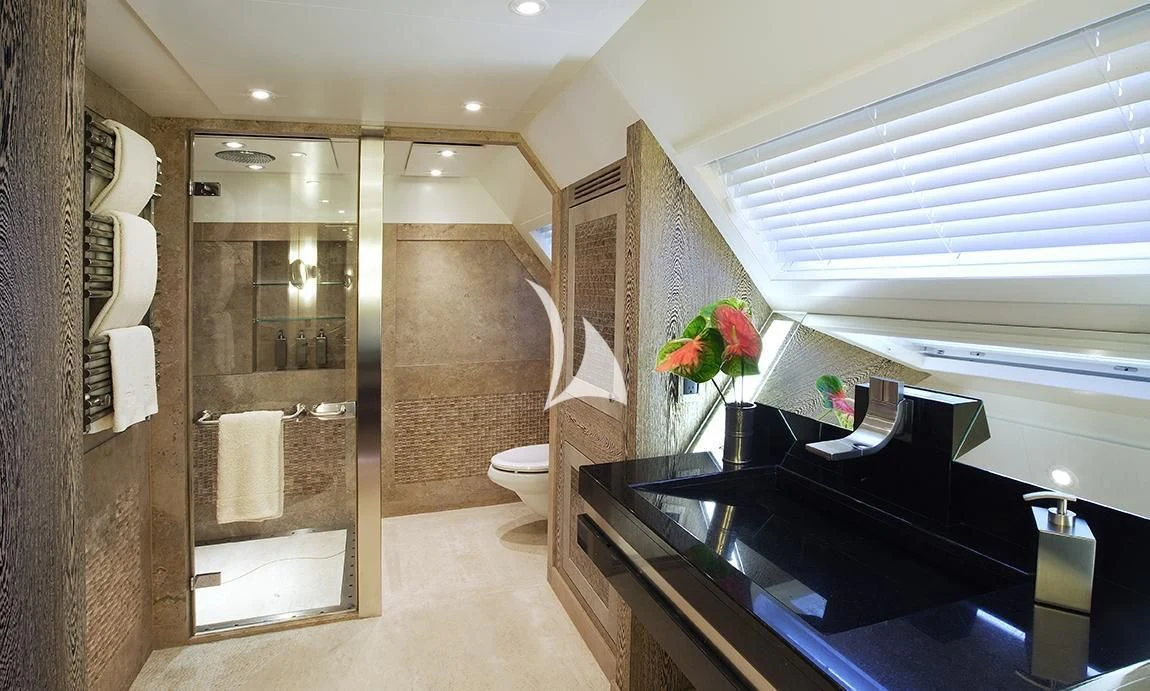 a bathroom with a glass shower aboard HEMISPHERE Yacht for Sale