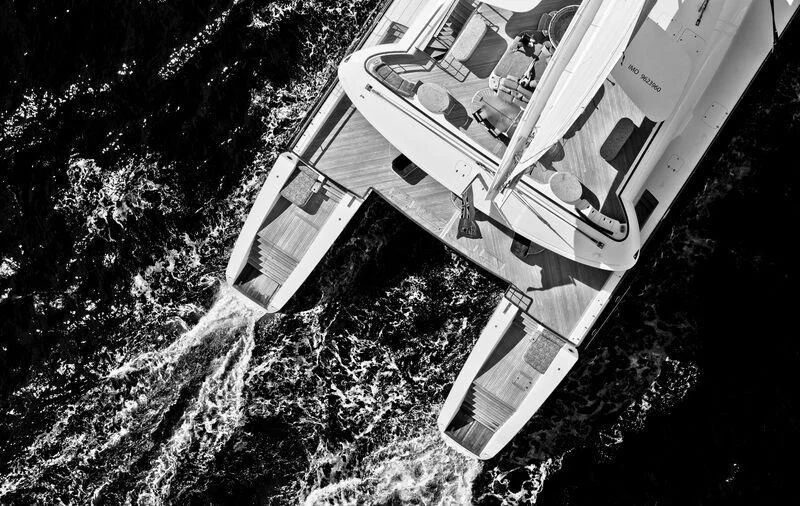 a plane flying over a town aboard HEMISPHERE Yacht for Sale