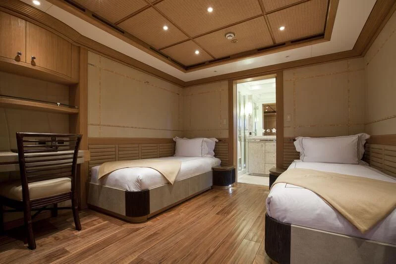 a room with two beds aboard HEMISPHERE Yacht for Sale