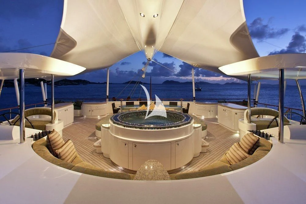 a large white tent with a large white dome and a large white umbrella aboard HEMISPHERE Yacht for Sale
