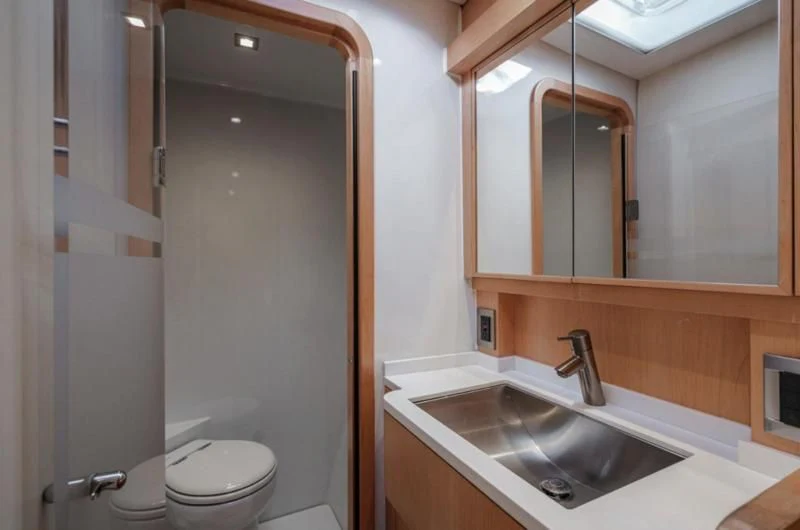 a bathroom with a sink and a toilet aboard MY CAT Yacht for Sale