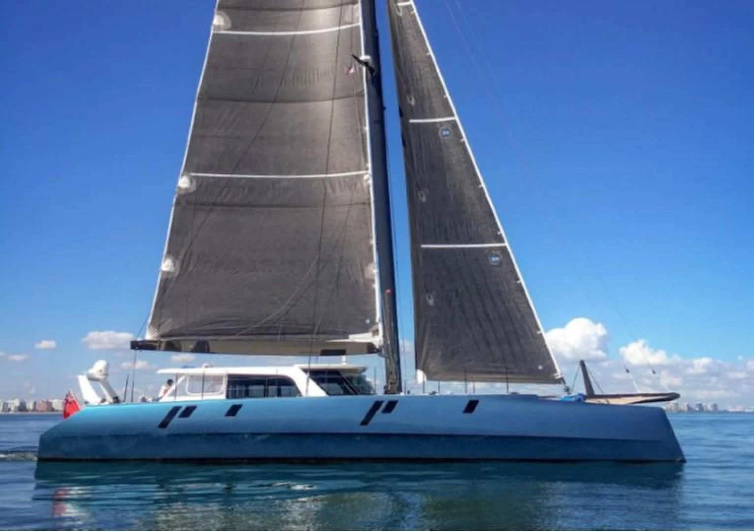 a boat on the water aboard MY CAT Yacht for Sale