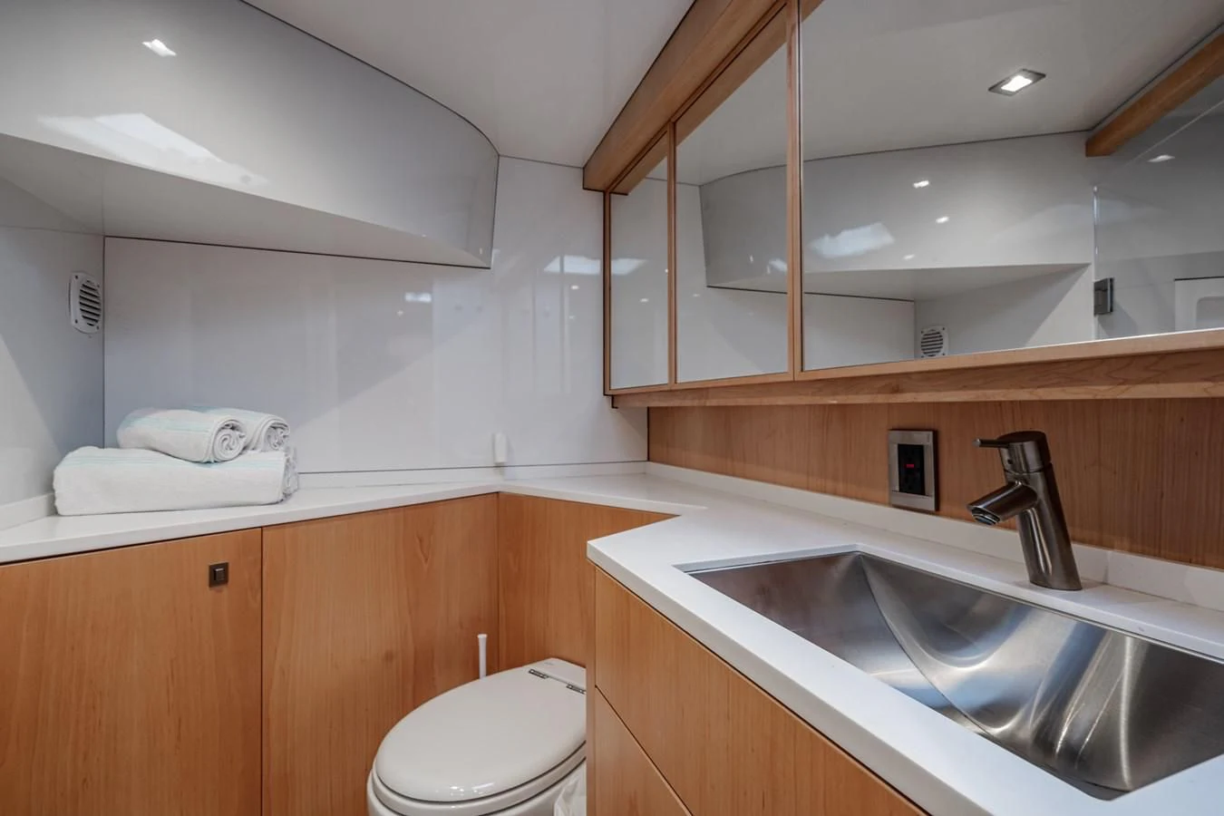a bathroom with a sink and a toilet aboard MY CAT Yacht for Sale