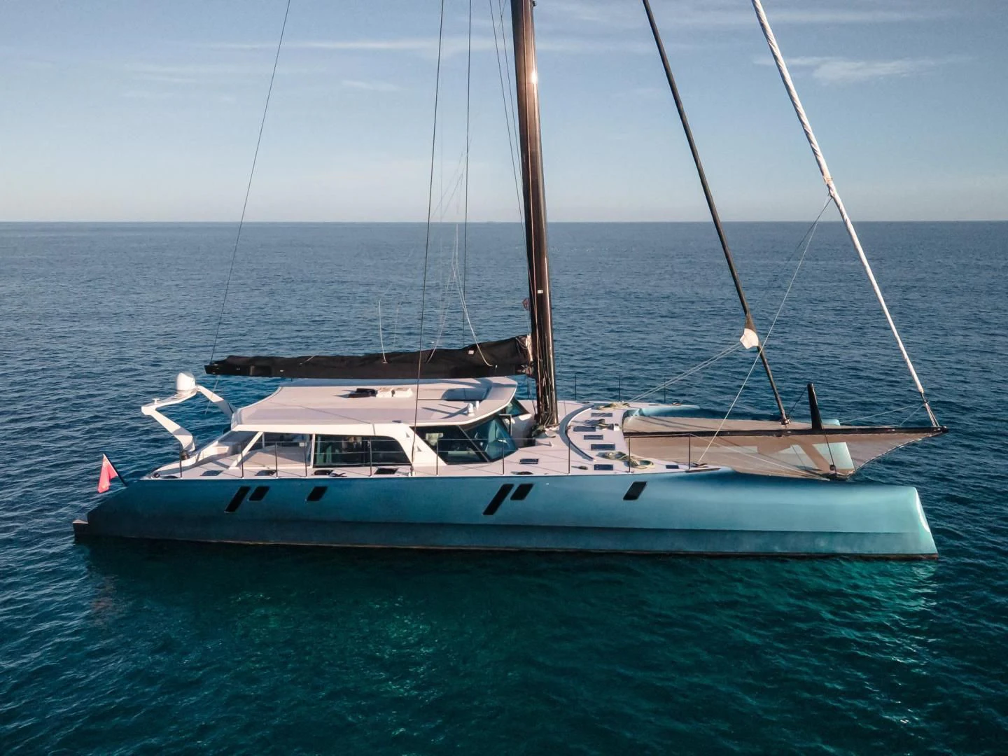 a boat on the water aboard MY CAT Yacht for Sale