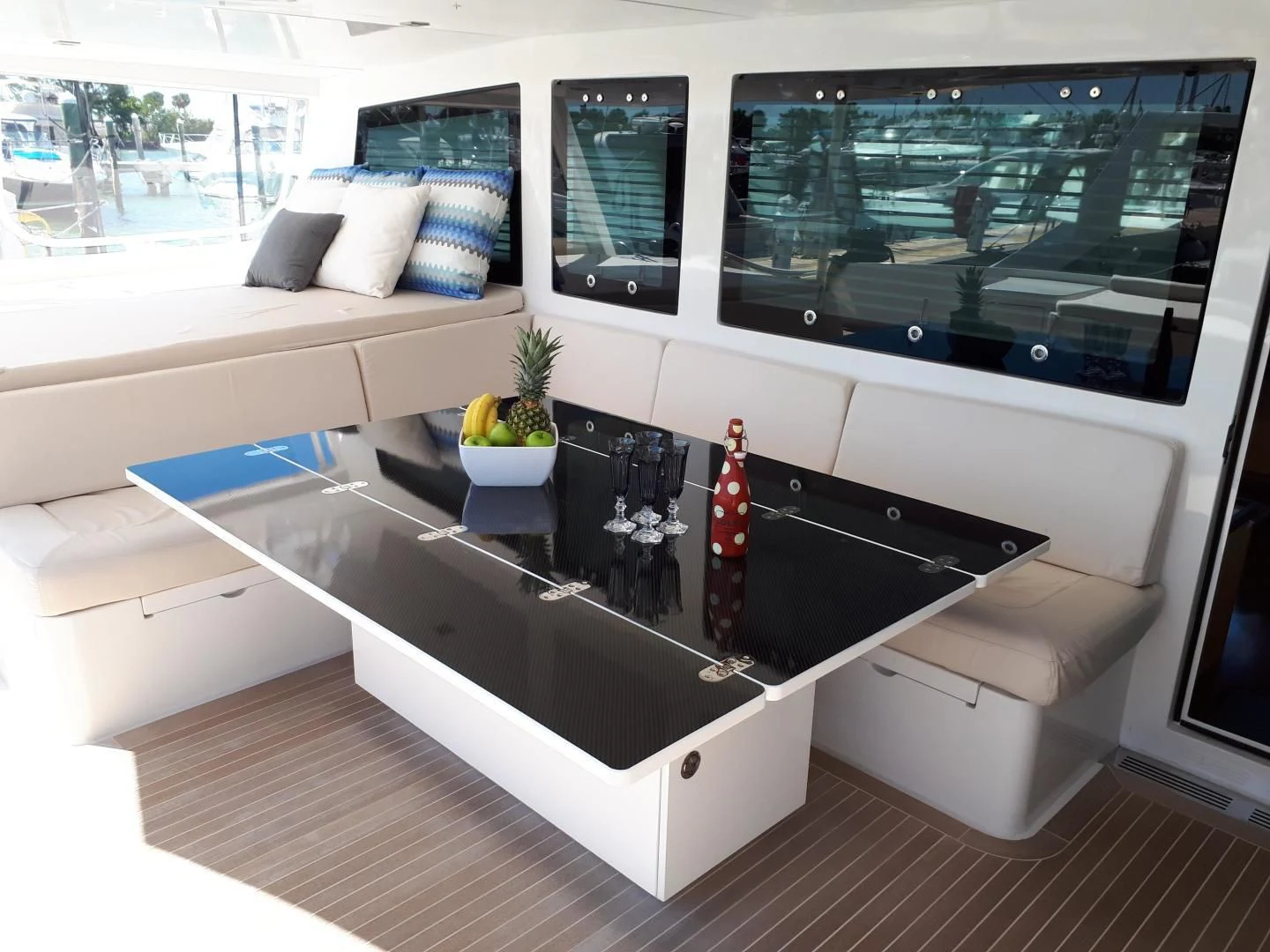 a room with a large glass display aboard MY CAT Yacht for Sale