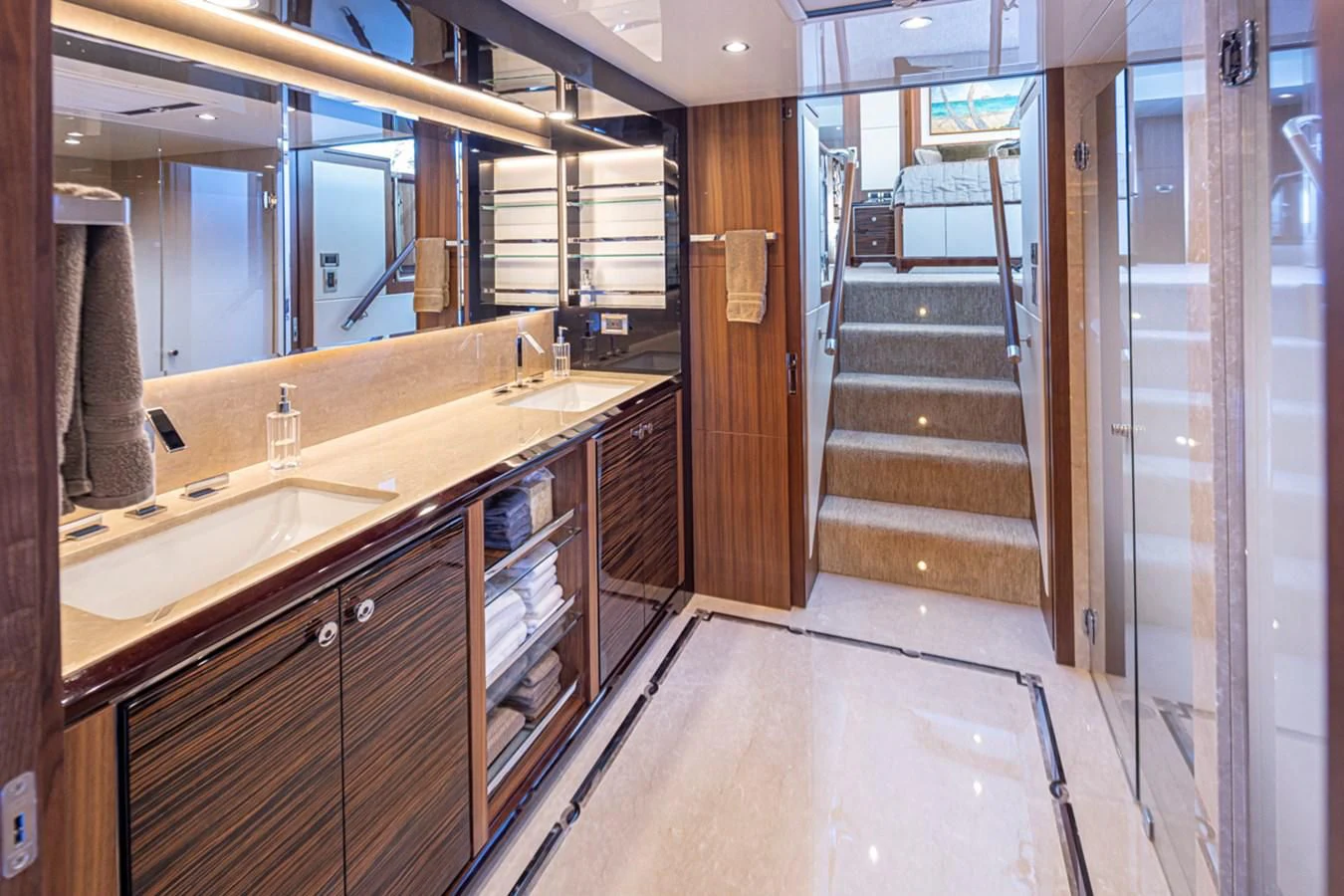 a bathroom with a large mirror aboard HYAK Yacht for Sale