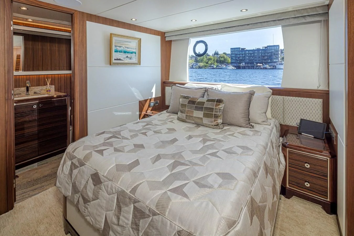 a bedroom with a large bed aboard HYAK Yacht for Sale
