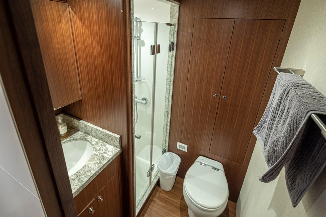 a bathroom with a sink toilet and a shower aboard HYAK Yacht for Sale