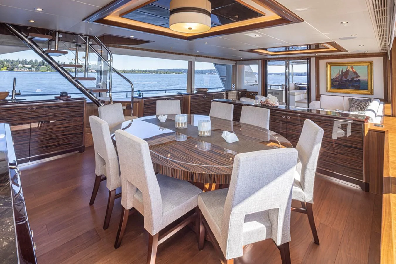 a dining table in a restaurant aboard HYAK Yacht for Sale
