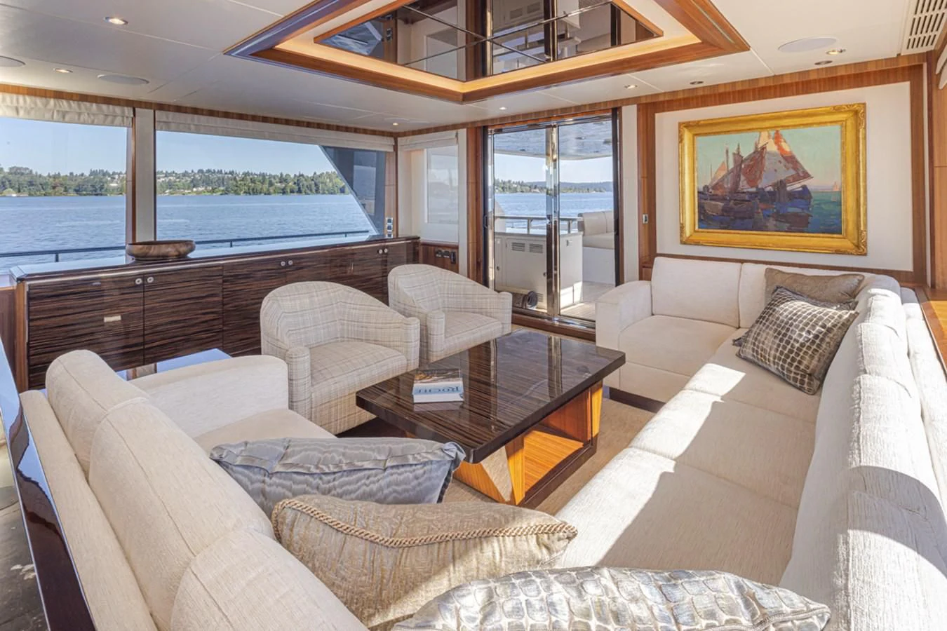a living room with a large window aboard HYAK Yacht for Sale