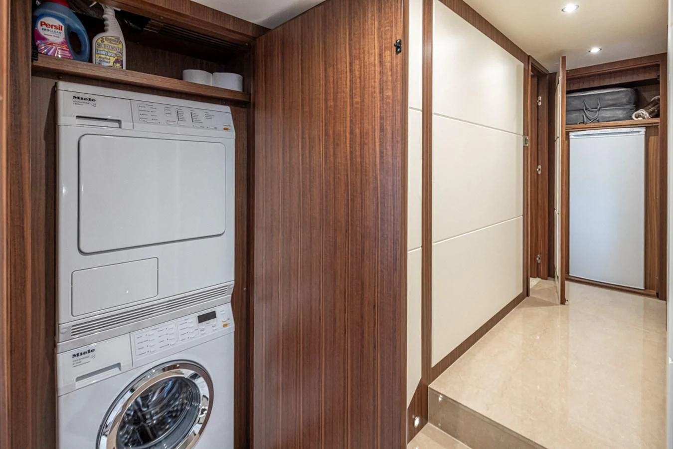 a kitchen with a washing machine aboard HYAK Yacht for Sale