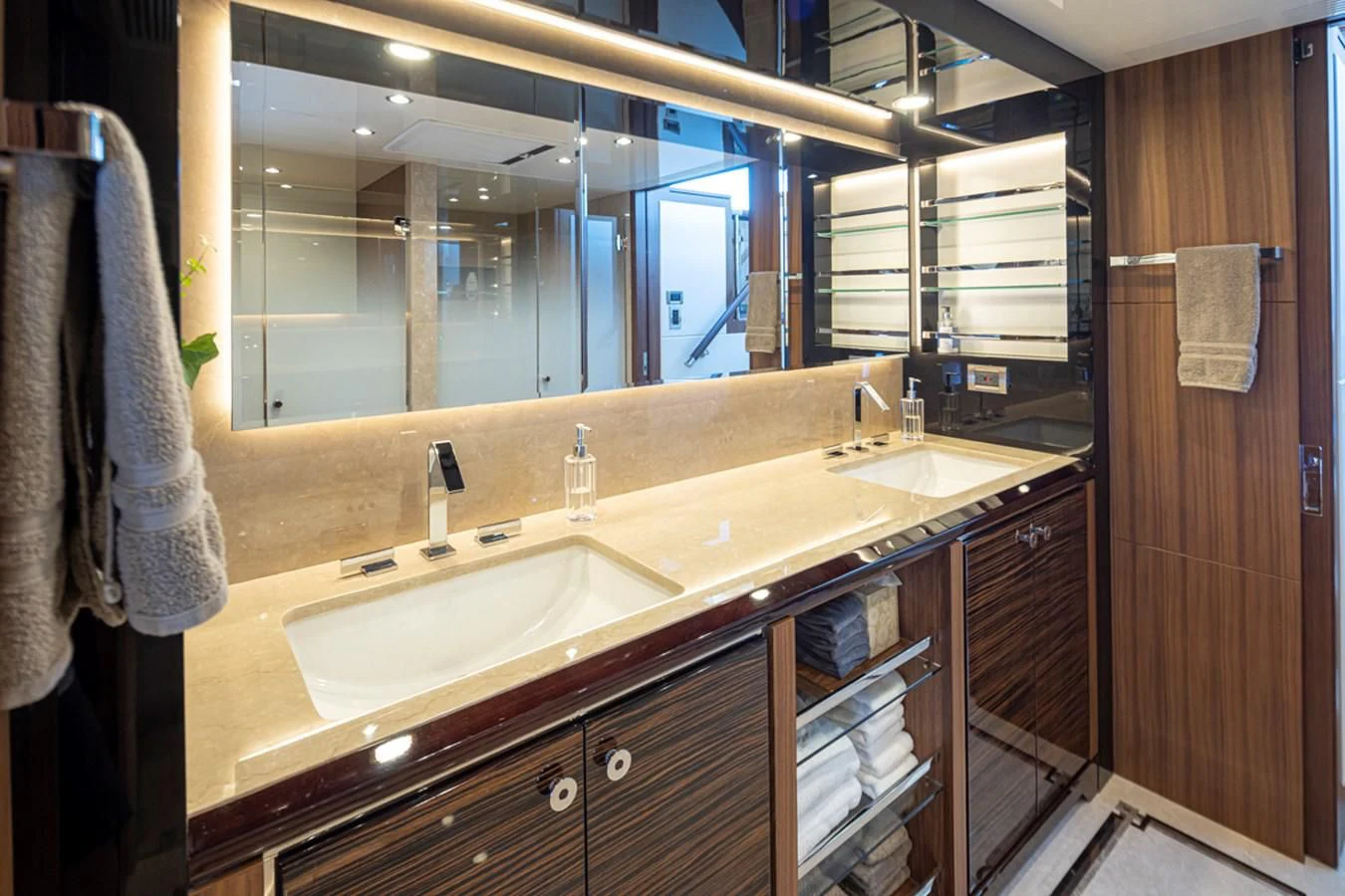 a bathroom with a large mirror aboard HYAK Yacht for Sale
