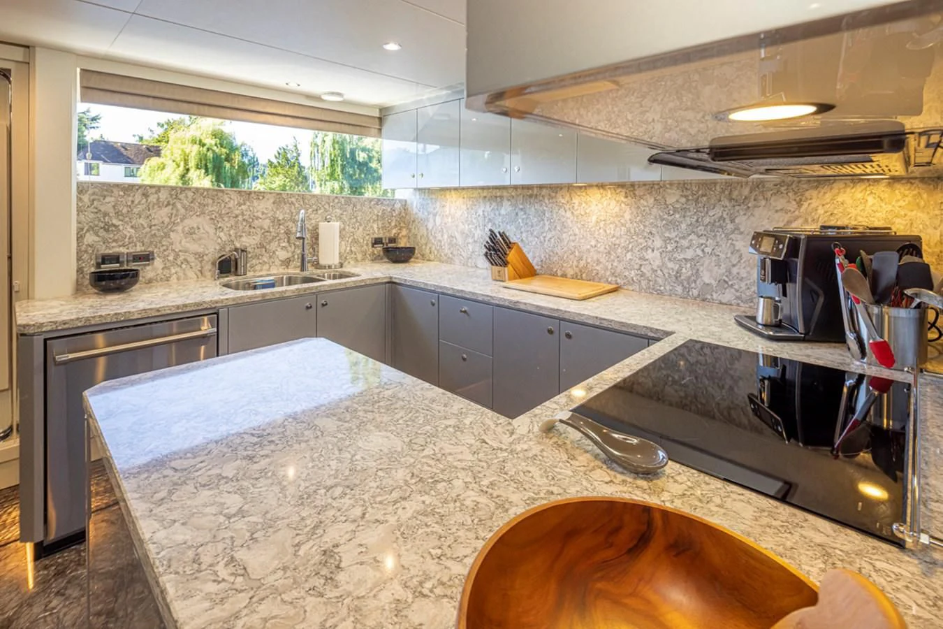 a kitchen with a large counter aboard HYAK Yacht for Sale