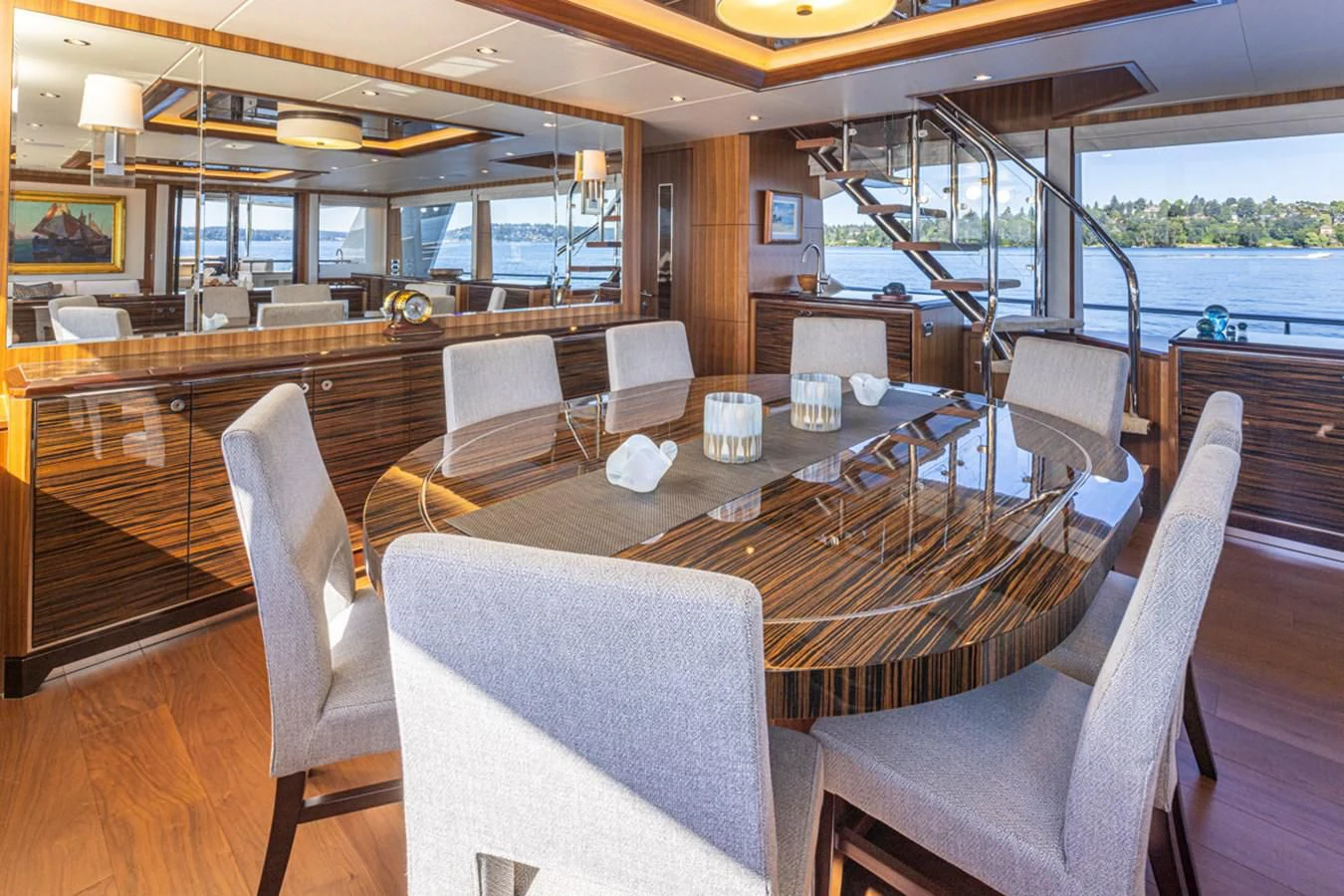 a large dining table in a restaurant aboard HYAK Yacht for Sale