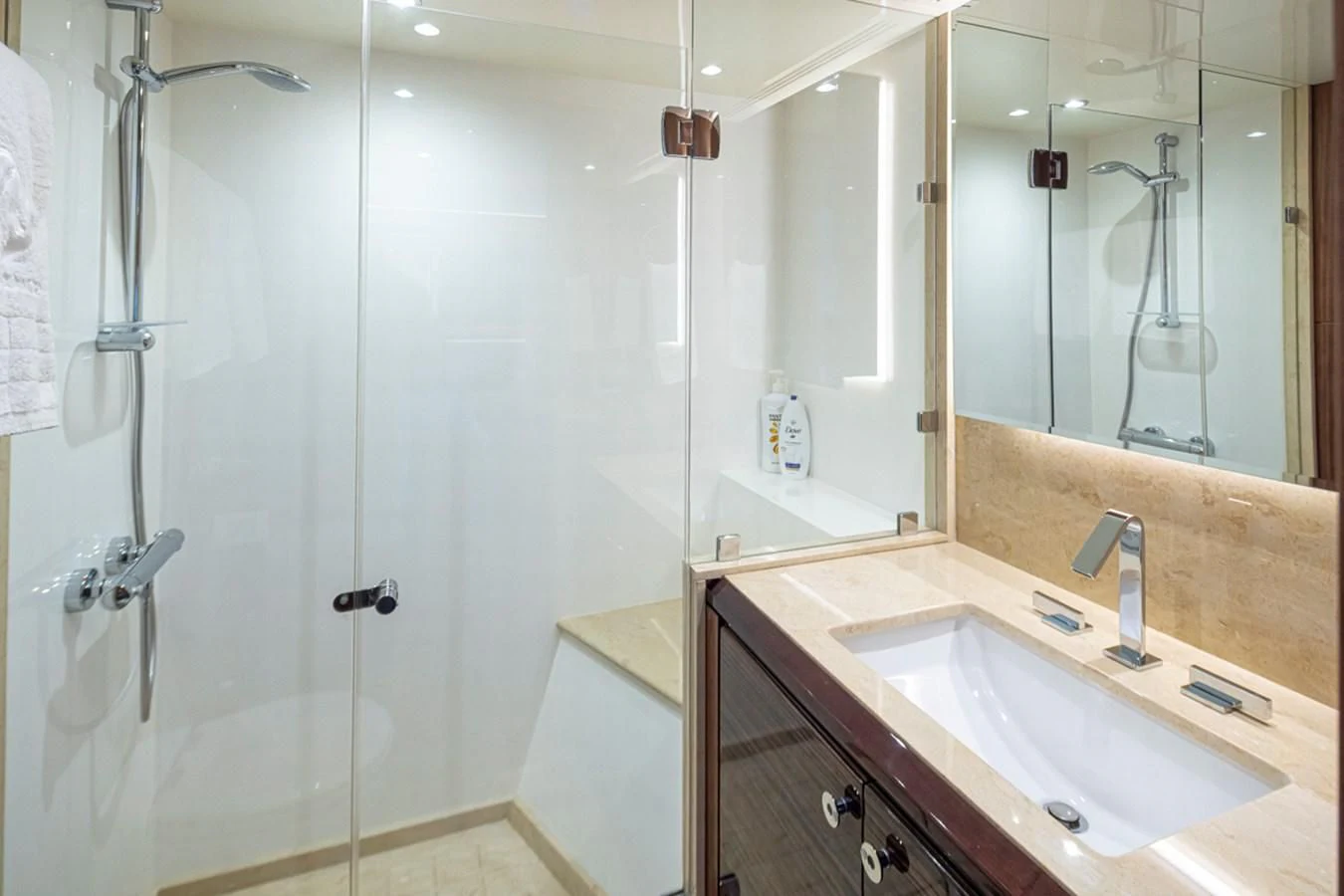 a bathroom with a shower and sink aboard HYAK Yacht for Sale