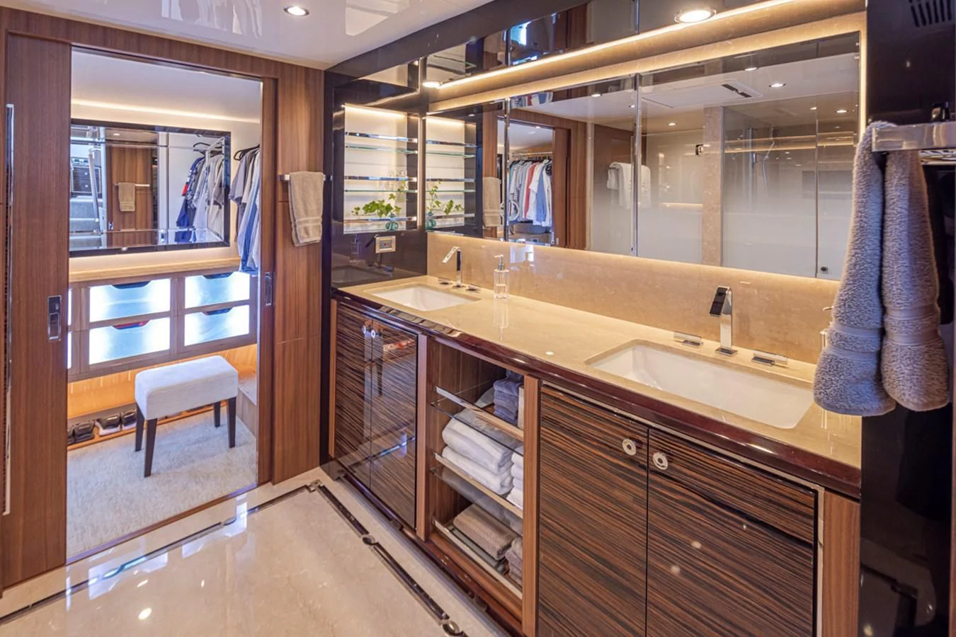 a bathroom with a large mirror aboard HYAK Yacht for Sale