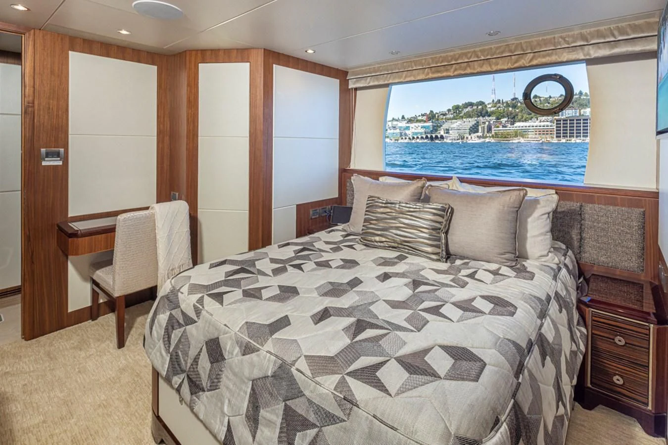 a large bed in a room aboard HYAK Yacht for Sale