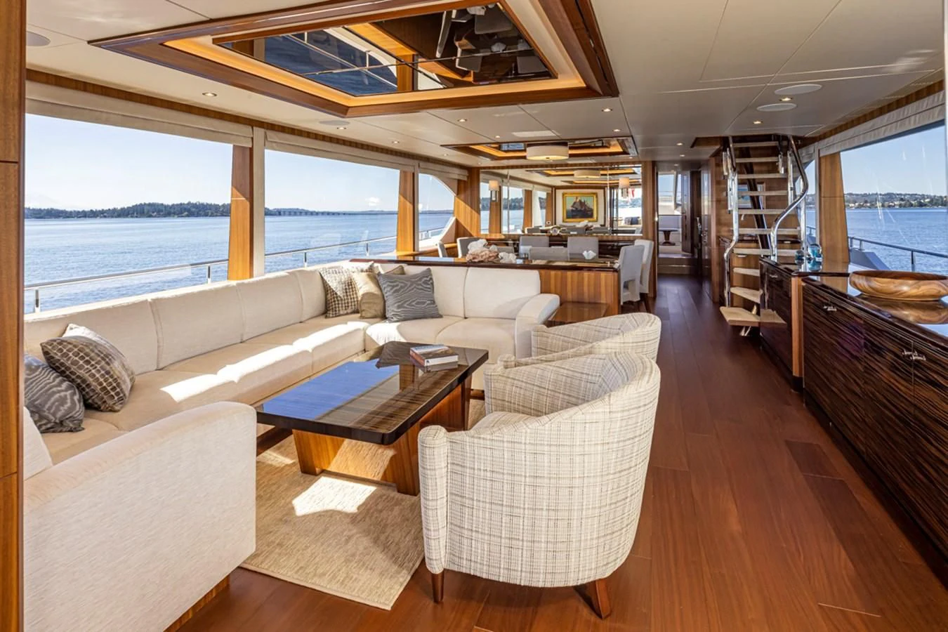a living room with a large window aboard HYAK Yacht for Sale