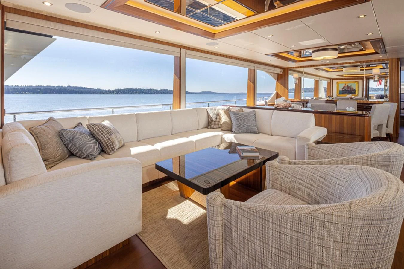 a living room with a large window aboard HYAK Yacht for Sale
