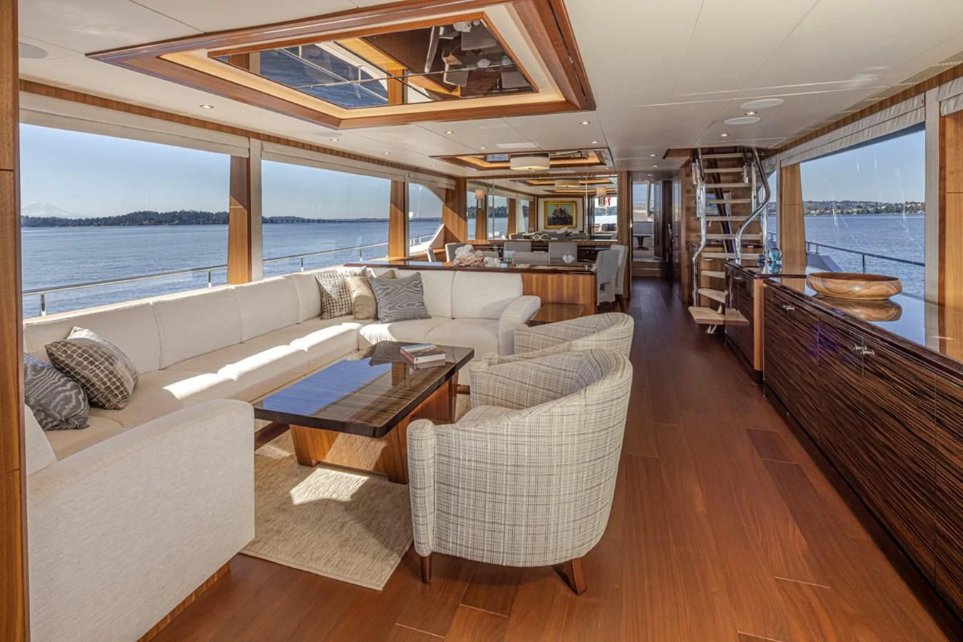 a living room with a large window aboard HYAK Yacht for Sale