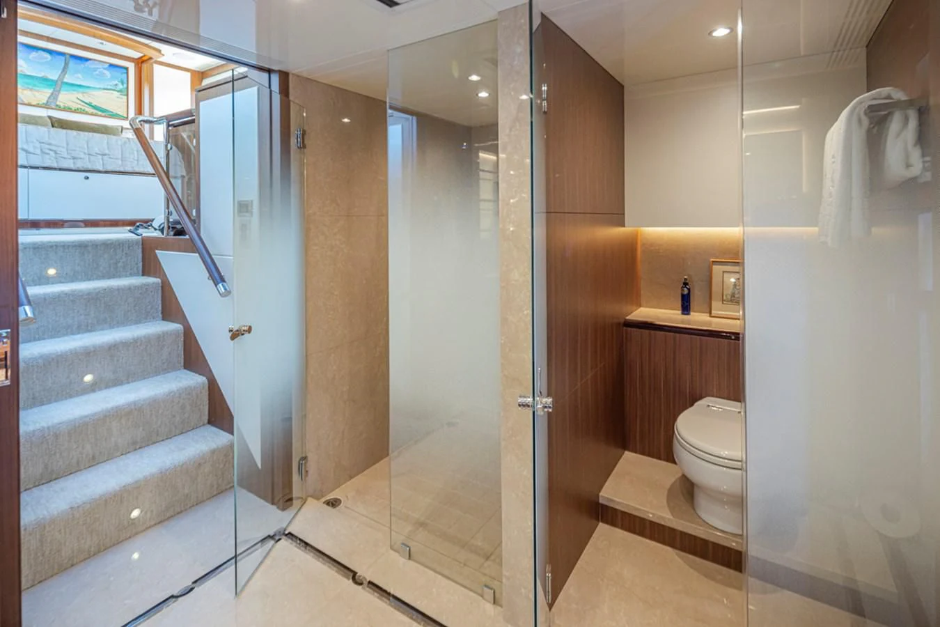 a bathroom with a glass door aboard HYAK Yacht for Sale