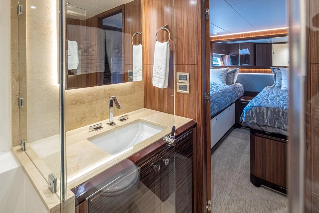 a bathroom with a sink and a mirror aboard HYAK Yacht for Sale