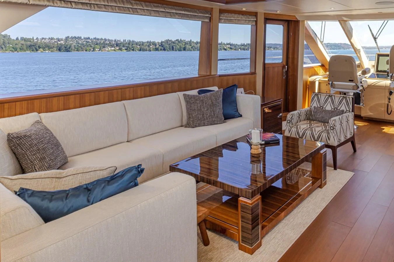 a living room with a large window aboard HYAK Yacht for Sale