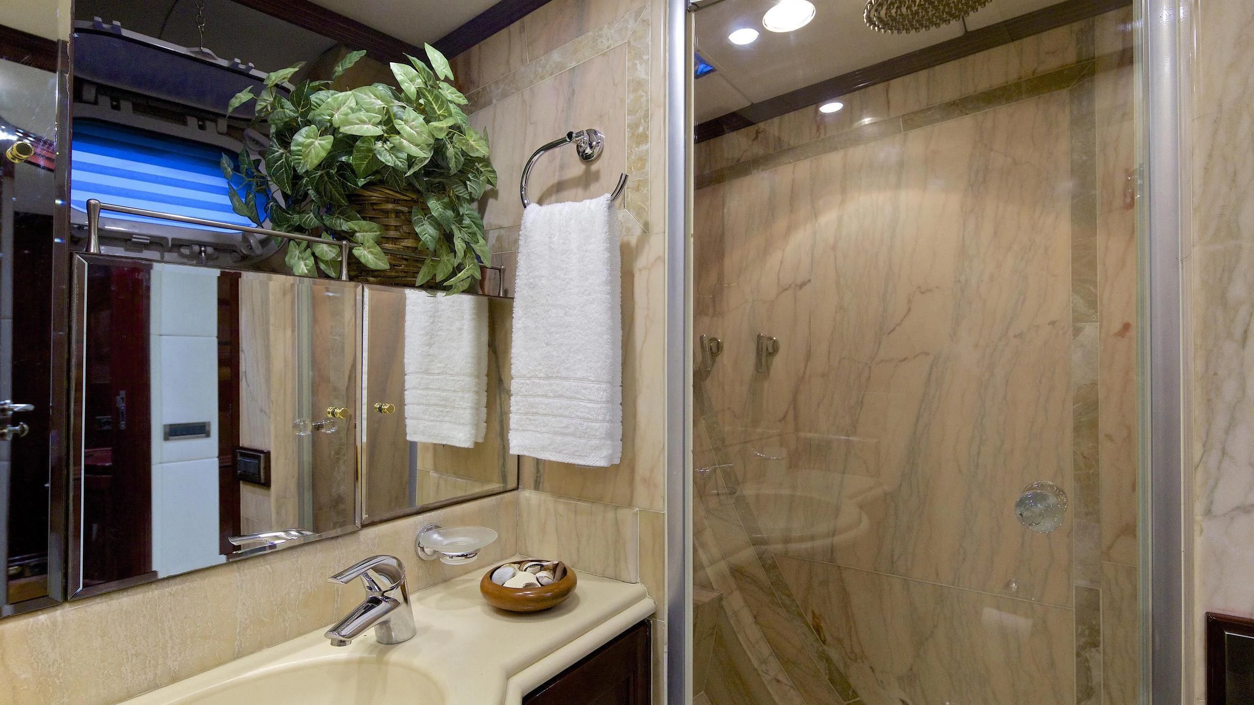a bathroom with a shower curtain aboard ALLURE A Yacht for Sale