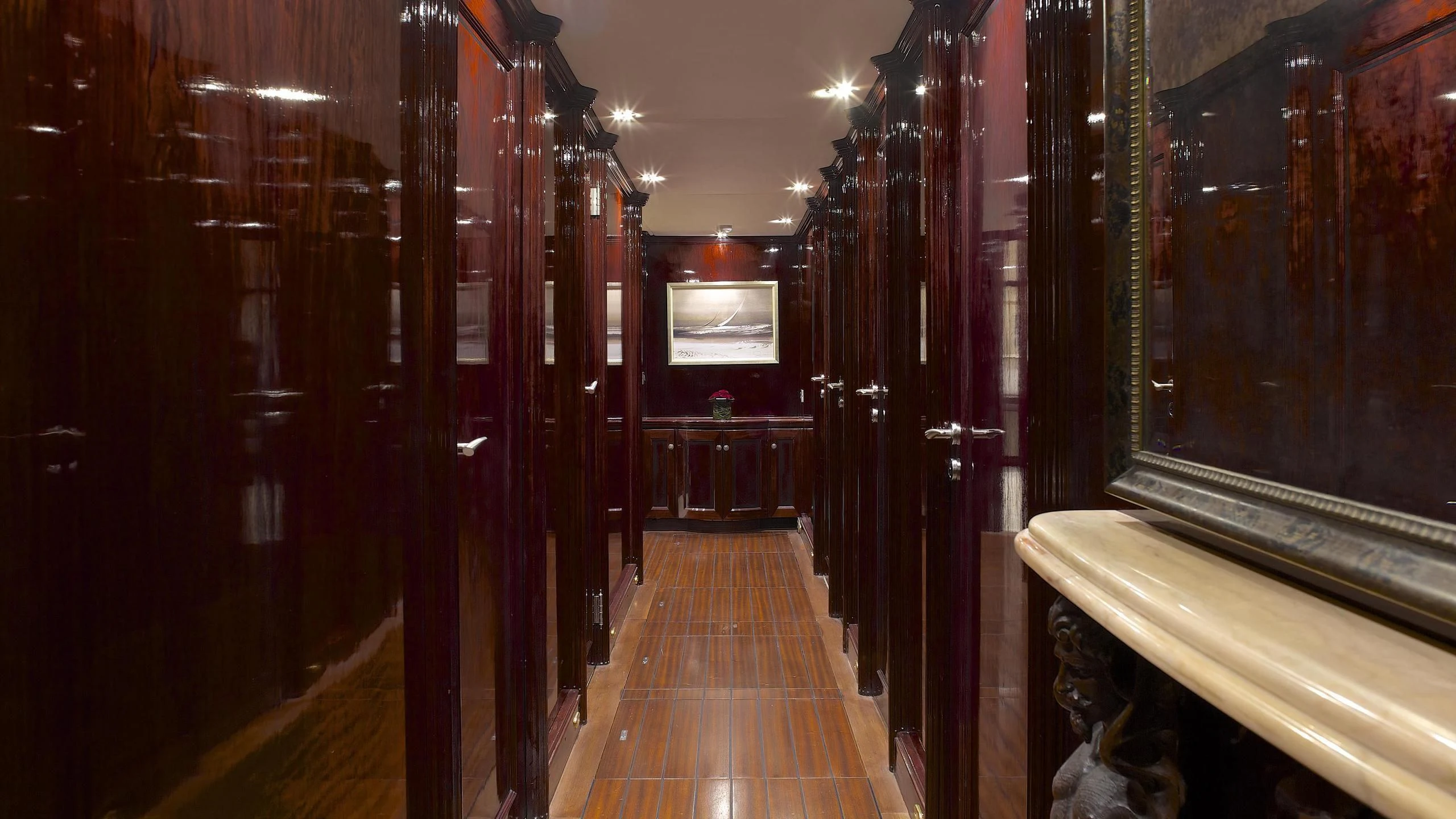 a hallway with wood doors aboard ALLURE A Yacht for Sale