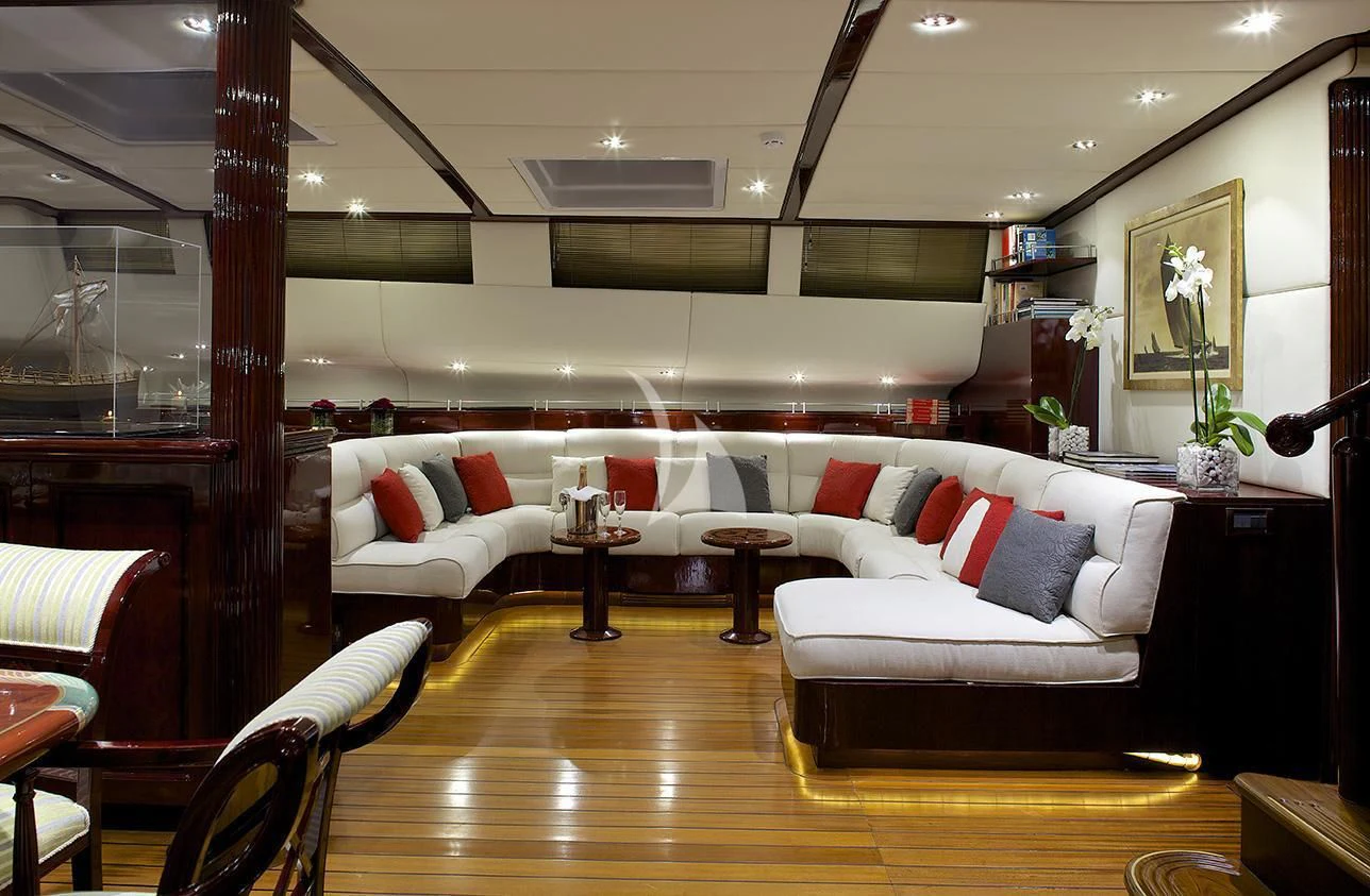 a living room with a wood floor aboard ALLURE A Yacht for Sale